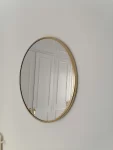 espejo circular dorado 